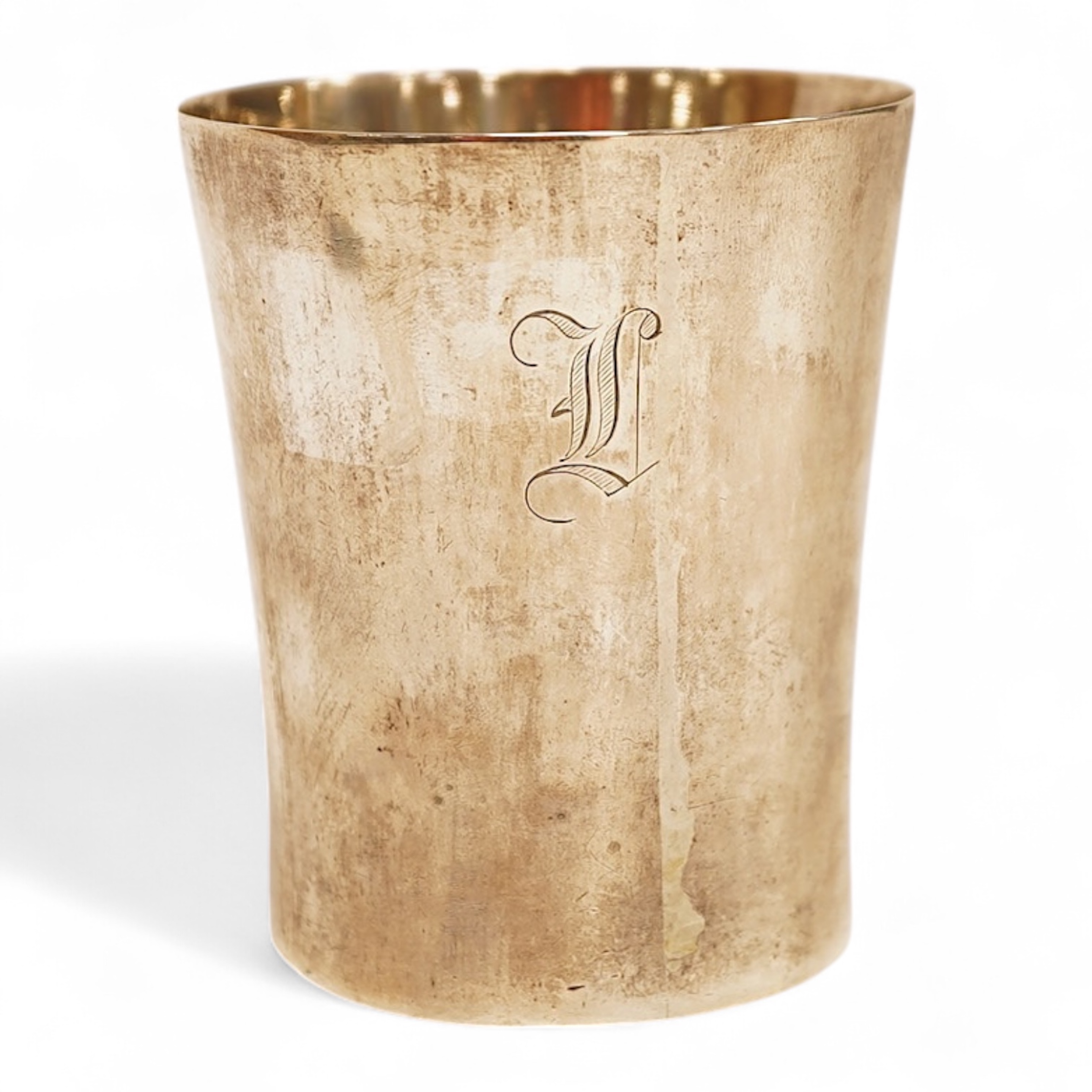 A white metal beaker the base inset with a silver medal commemorating the Peace of Oliva, 1660, Obv. Bird's-eye view of the city of Danzig with troops moving in foreground; above, an eagle crowned, an olive branch in its